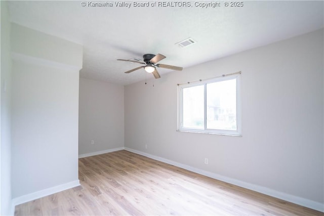 2023 Roxalana Rd, Dunbar, WV 25064 - spare room featuring ceiling fan and light wood-style floors