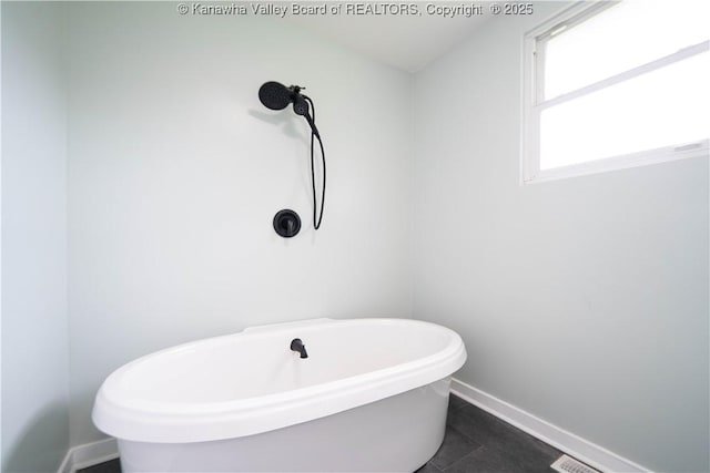 2023 Roxalana Rd, Dunbar, WV 25064 - bathroom with a soaking tub and tile patterned flooring