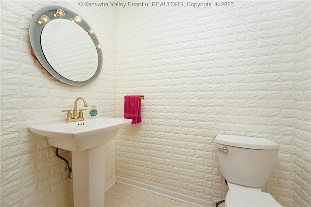 32 Carriage Rd, Charleston, WV 25314 - half bathroom featuring toilet and tile patterned floors