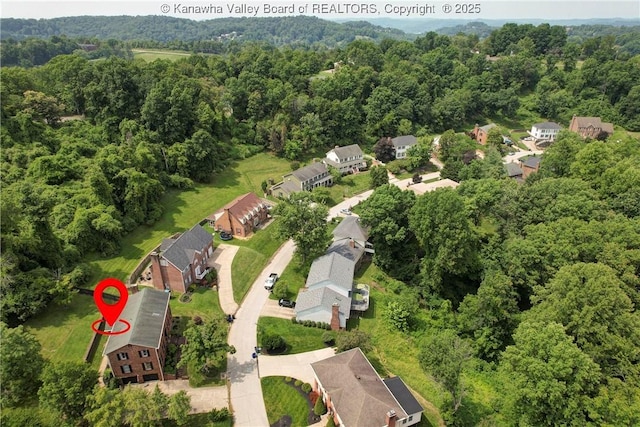 32 Carriage Rd, Charleston, WV 25314 - view of property location featuring a heavily wooded area and nearby suburban area