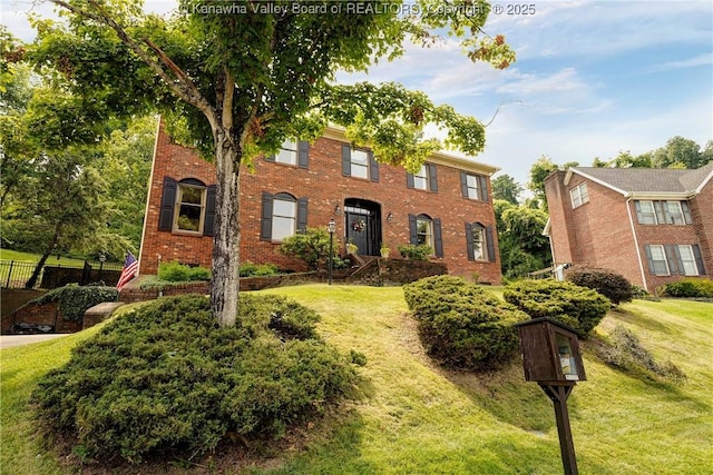 32 Carriage Rd, Charleston, WV 25314 - colonial-style house with brick siding