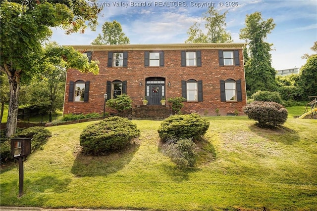 32 Carriage Rd, Charleston, WV 25314 - view of front of home with brick siding and a front yard