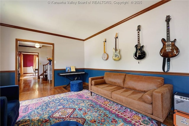 32 Carriage Rd, Charleston, WV 25314 - living area with wood finished floors, crown molding, and wainscoting