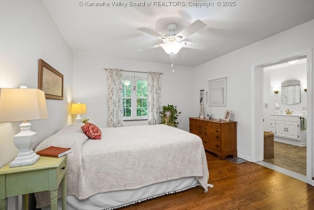 2603 Hollister Dr, Charleston, WV 25302 - bedroom with wood finished floors, connected bathroom, and ceiling fan