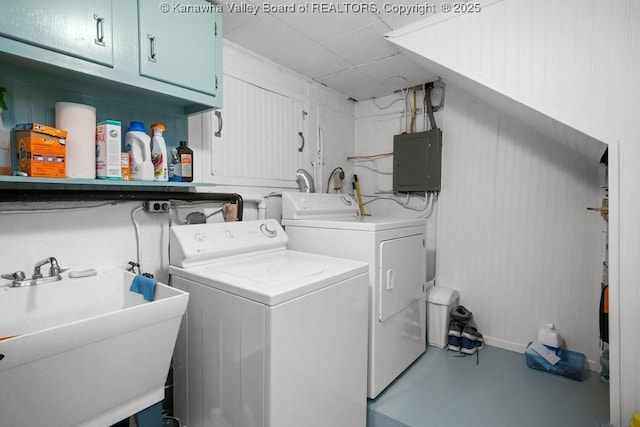 2603 Hollister Dr, Charleston, WV 25302 - laundry area with cabinet space, washer and dryer, and electric panel