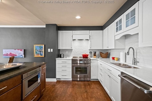 1578 Kanawha Blvd Unit 7C, Charleston, WV 25311 - kitchen with stainless steel appliances, custom range hood, backsplash, dark wood-style floors, and recessed lighting