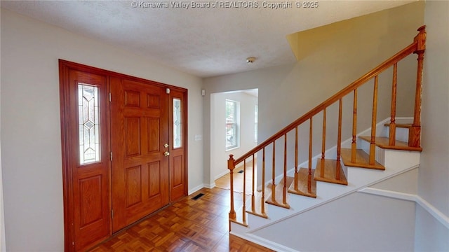 81 Hamill Rd, Huntington, WV 25701 - foyer with stairs and a textured ceiling