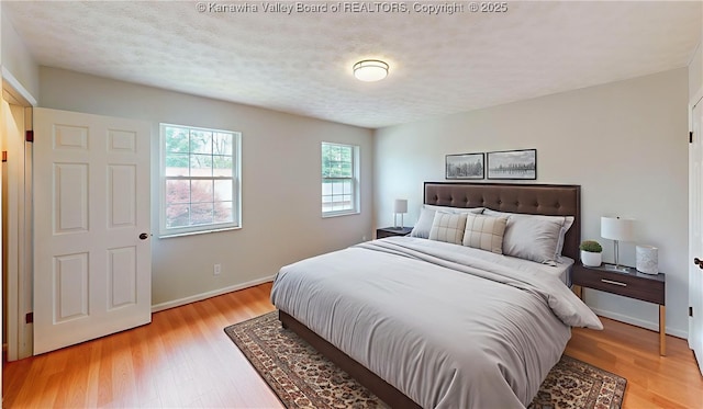 81 Hamill Rd, Huntington, WV 25701 - bedroom featuring light wood-style flooring and baseboards