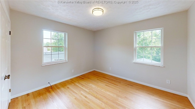 81 Hamill Rd, Huntington, WV 25701 - unfurnished room featuring light wood-type flooring and baseboards