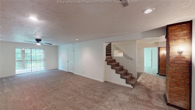 81 Hamill Rd, Huntington, WV 25701 - unfurnished living room with carpet flooring, a textured ceiling, stairs, a ceiling fan, and recessed lighting