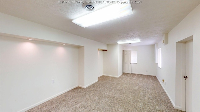 81 Hamill Rd, Huntington, WV 25701 - basement with carpet and a textured ceiling