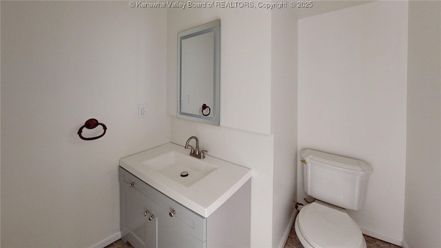 81 Hamill Rd, Huntington, WV 25701 - half bath featuring vanity and toilet