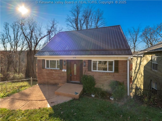 1216 Oakmont Rd, Charleston, WV 25314 - view of front of home with brick siding and a metal roof