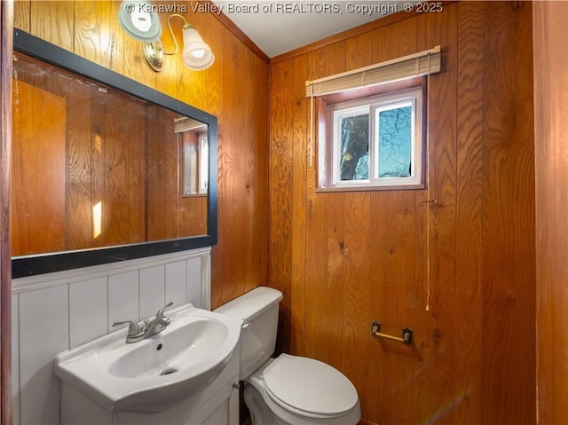 1216 Oakmont Rd, Charleston, WV 25314 - half bathroom featuring wooden walls and vanity