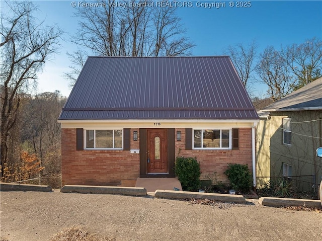 1216 Oakmont Rd, Charleston, WV 25314 - view of front of house with brick siding and a metal roof