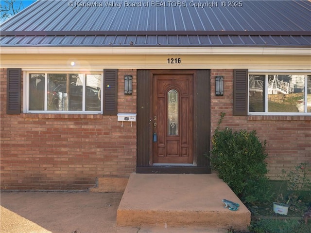 1216 Oakmont Rd, Charleston, WV 25314 - property entrance featuring a metal roof and brick siding