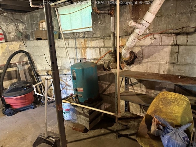 23908 Coal River Rd, Wv, WV 25148 - unfinished below grade area featuring a water pressure tank