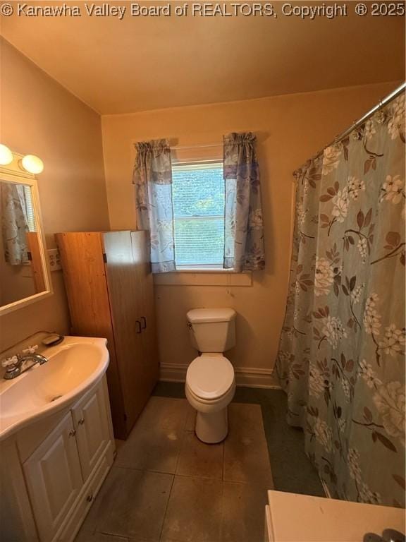 23908 Coal River Rd, Wv, WV 25148 - bathroom featuring vanity, tile patterned floors, and a shower with shower curtain