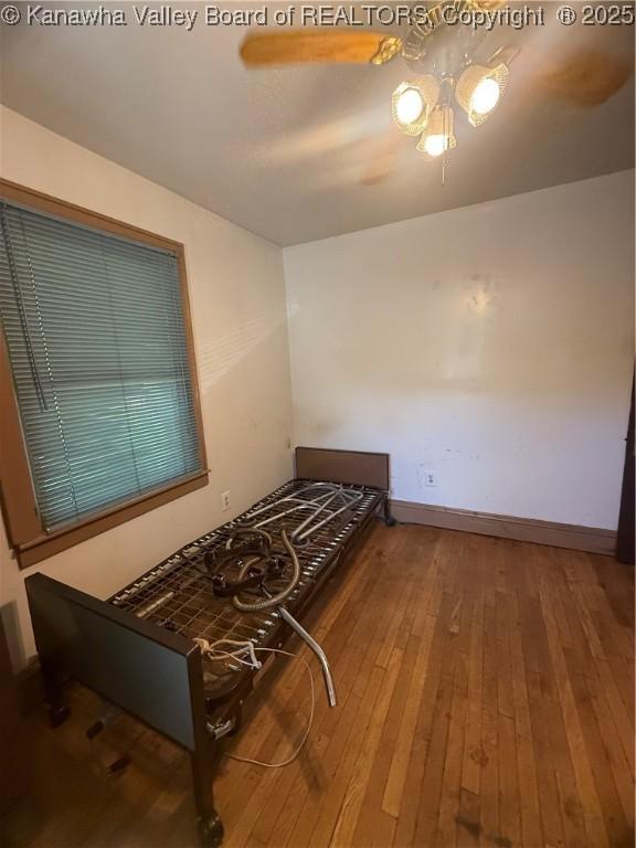 23908 Coal River Rd, Wv, WV 25148 - bedroom featuring hardwood / wood-style floors
