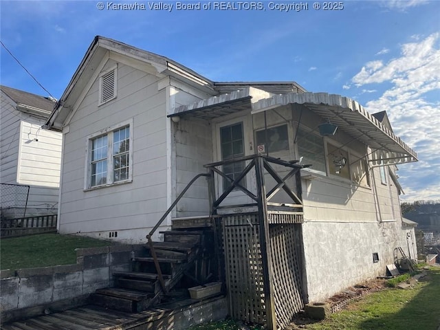 1325 Stuart St, Charleston, WV 25302 - rear view of house with crawl space