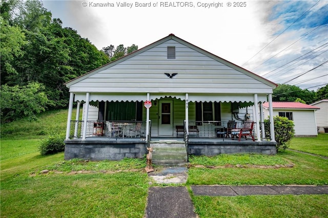 449 Lee Creek Rd, Culloden, WV 25510 - view of front of house with a porch and a front lawn