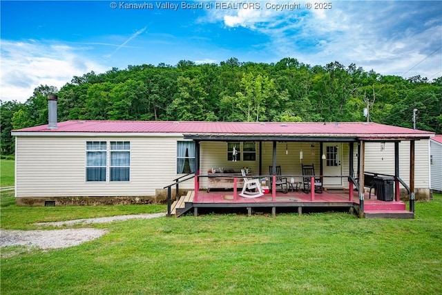 449 Lee Creek Rd, Culloden, WV 25510 - rear view of house with a yard, a metal roof, and crawl space