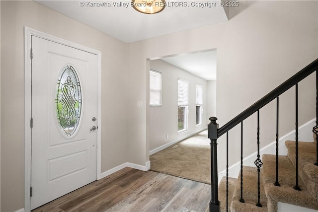 207 Branchfield Dr, Charleston, WV 25314 - foyer entrance with wood finished floors and stairs