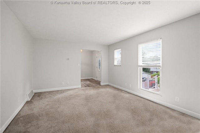 207 Branchfield Dr, Charleston, WV 25314 - carpeted empty room featuring baseboards