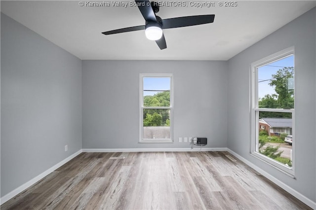 207 Branchfield Dr, Charleston, WV 25314 - unfurnished room with healthy amount of natural light, wood finished floors, and ceiling fan