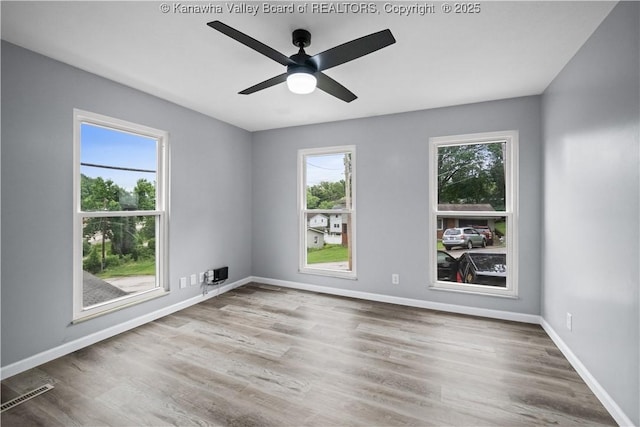 207 Branchfield Dr, Charleston, WV 25314 - empty room with wood finished floors and a ceiling fan