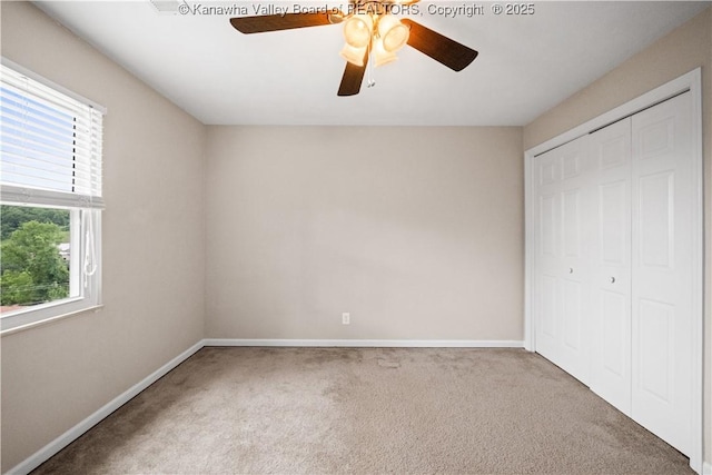 207 Branchfield Dr, Charleston, WV 25314 - unfurnished bedroom with carpet flooring, a closet, and a ceiling fan