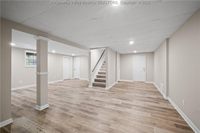 207 Branchfield Dr, Charleston, WV 25314 - basement featuring light wood-style floors, stairway, recessed lighting, and a drop ceiling