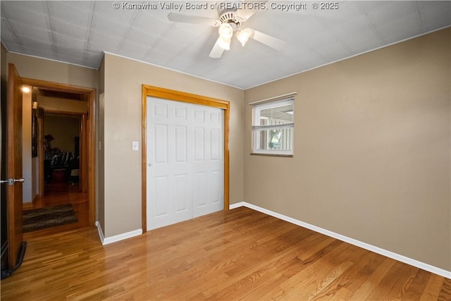 1204 Crown Dr, South Charleston, WV 25309 - unfurnished bedroom with light wood-style flooring, a closet, and ceiling fan