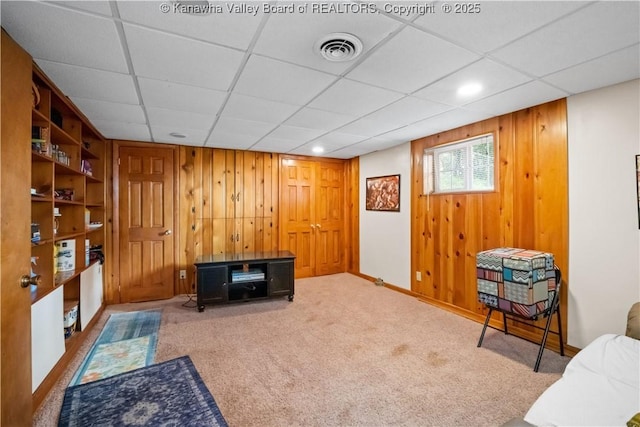 1204 Crown Dr, South Charleston, WV 25309 - living area featuring wood walls, carpet flooring, a paneled ceiling, and recessed lighting
