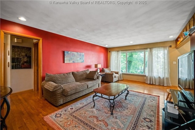 1204 Crown Dr, South Charleston, WV 25309 - living room featuring wood finished floors and recessed lighting