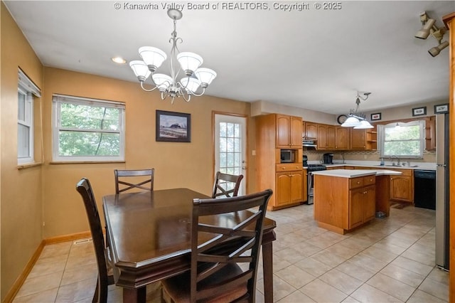 1204 Crown Dr, South Charleston, WV 25309 - dining room featuring a chandelier, light tile patterned floors, and recessed lighting