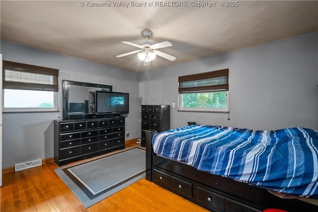 1204 Crown Dr, South Charleston, WV 25309 - bedroom featuring wood finished floors and ceiling fan
