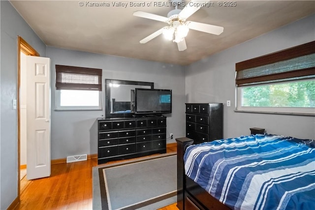 1204 Crown Dr, South Charleston, WV 25309 - bedroom with wood finished floors and ceiling fan
