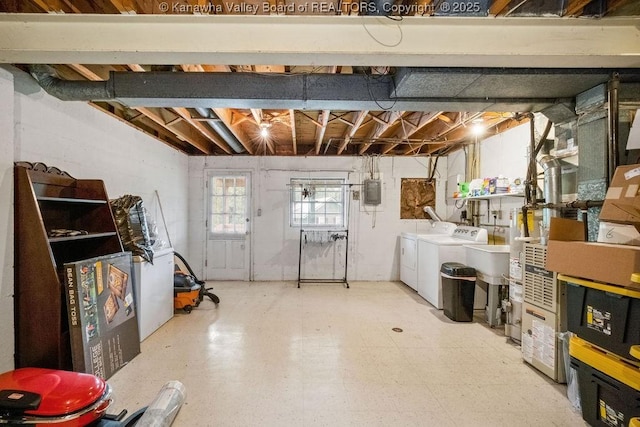 1013 Walnut Rd Unit 4, Charleston, WV 25314 - basement featuring washing machine and dryer and tile patterned floors