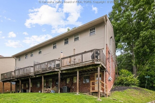 1013 Walnut Rd Unit 4, Charleston, WV 25314 - rear view of house with a lawn, a wooden deck, and brick siding