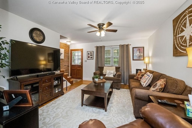 1013 Walnut Rd Unit 4, Charleston, WV 25314 - living area featuring light wood finished floors, a ceiling fan, and stairs