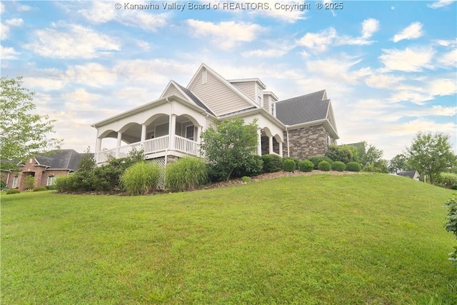 365 Tyler Way, Scott Depot, WV 25560 - view of property exterior with a lawn and stone siding