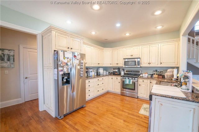 365 Tyler Way, Scott Depot, WV 25560 - kitchen featuring appliances with stainless steel finishes, recessed lighting, and light wood finished floors