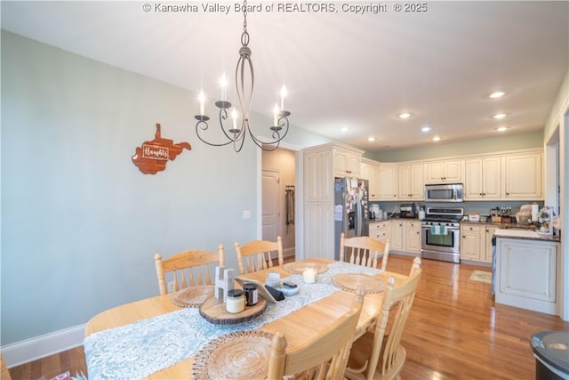 365 Tyler Way, Scott Depot, WV 25560 - dining space with recessed lighting, a chandelier, and light wood-type flooring