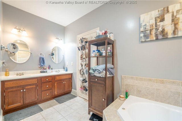 365 Tyler Way, Scott Depot, WV 25560 - full bathroom featuring tile patterned flooring, double vanity, and a garden tub