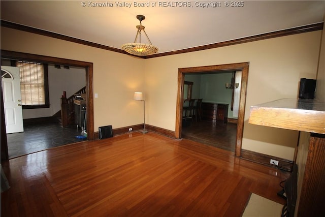 624 Randolph St, Charleston, WV 25302 - unfurnished dining area with ornamental molding and wood finished floors