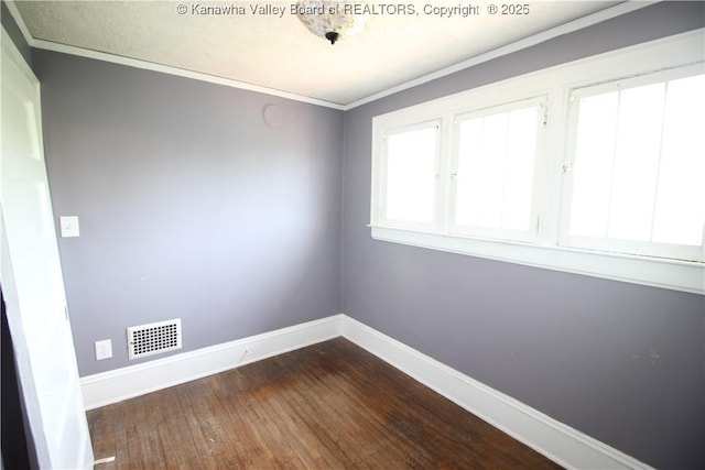 624 Randolph St, Charleston, WV 25302 - empty room with dark wood-style flooring and ornamental molding
