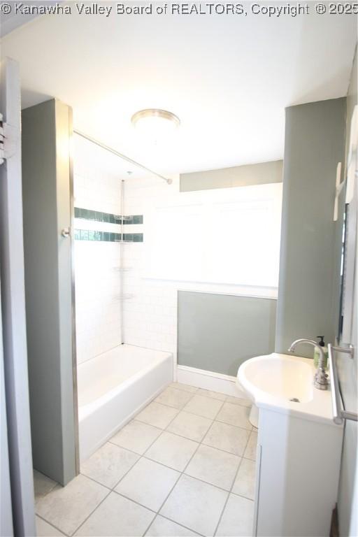 624 Randolph St, Charleston, WV 25302 - bathroom with tile patterned floors, plenty of natural light, vanity, and shower / washtub combination