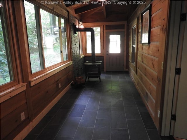 5609 Hurricane Creek Rd, Hurricane, WV 25526 - sunroom with a wood stove and beam ceiling