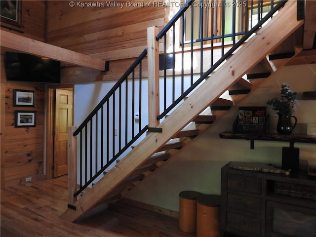 5609 Hurricane Creek Rd, Hurricane, WV 25526 - stairs featuring wood finished floors and wood walls